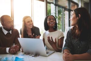 Group of people discussing lean management on a group project